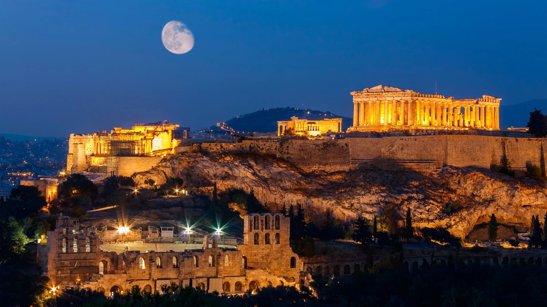 Athens—Acropolis at night; the land carries memory and intention to elevate